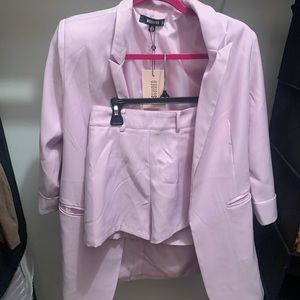 Blazer set color is lilac size 4